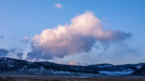 Time Lapse - Beautiful Clouds above Mountain Range at Sunset Video stock 121708397