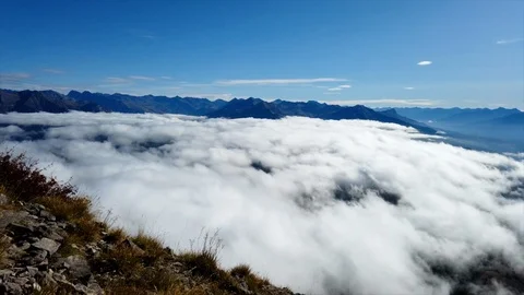 Time-lapse of beautiful clouds floating over mountains Video stock 119122919