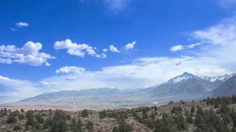 Time Lapse - Beautiful Clouds Moving Over Mountain Stock Footage 49547993