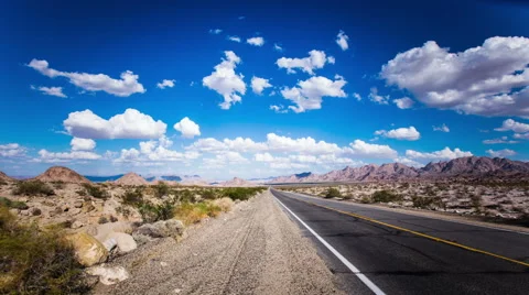 Time Lapse - Beautiful Clouds Moving Over the Road Vídeos de archivo 54753735