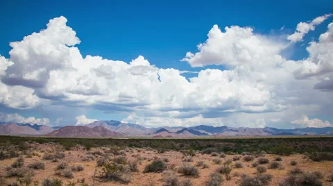 Time Lapse - Beautiful Clouds Moving Over Mountain Range Video stock 54754007