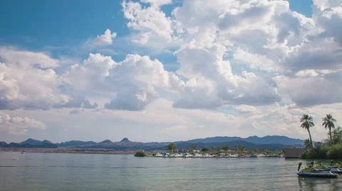 Time Lapse - Beautiful Clouds Moving Over Lake Stock Footage 54754214