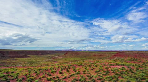 Time Lapse - Beautiful Clouds Moving Over Canyon with Green Fields Stock Footage 56592995