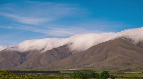 Time Lapse - Beautiful Clouds Moving Over Mountain Range Stock Footage 65225050