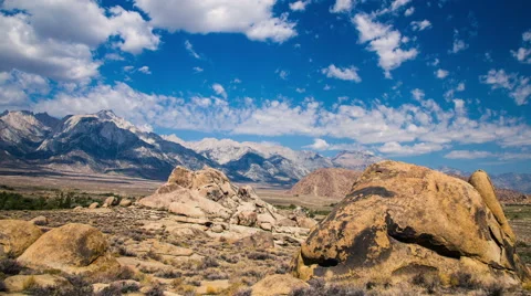Time Lapse - Beautiful Clouds Moving Over Rock Formation in Alabama Hills Stock Footage 65906372