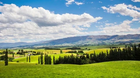 Time Lapse - Beautiful Clouds Moving Over the Valley Stock Footage 69896392