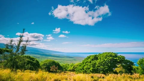 Time Lapse - Beautiful Clouds Moving Over the Hills with Ocean in the Background Video stock 72755491