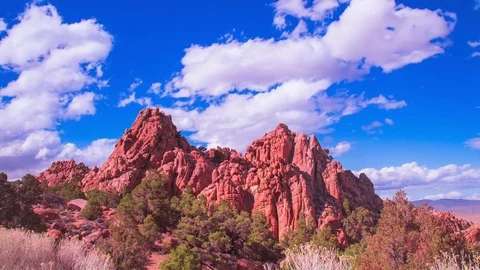 Time Lapse - Beautiful Clouds Moving over Rocks Stock Footage 74247344