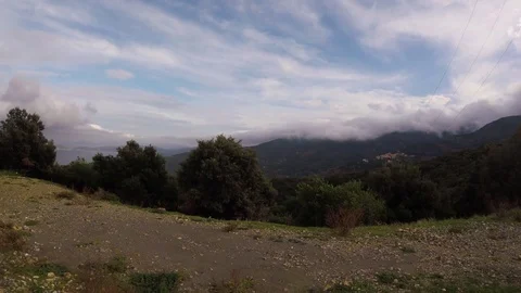 Time lapse of beautiful clouds moving over the hill on a a green island Stock Footage 82939980