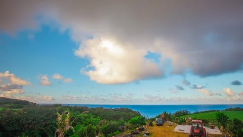 Time Lapse - Beautiful Clouds Moving Over the Ocean in the COnutry Side - 4K Stock Footage 88987062