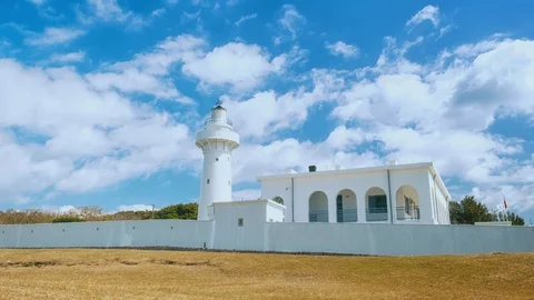 Time Lapse - Beautiful Clouds Moving Over Light House In Kenting, Taiwan - 4K Видео 124859082