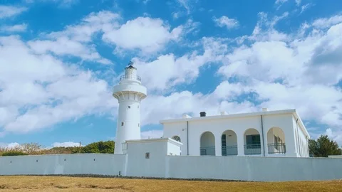 Time Lapse - Beautiful Clouds Moving Over Light House In Kenting, Taiwan - 4K Stock Footage 124859099