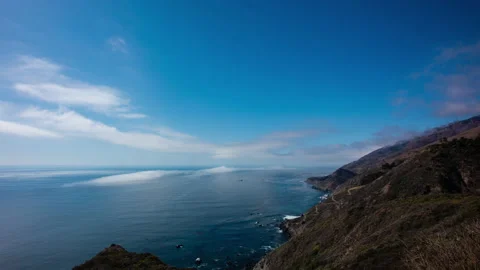 Time Lapse - Beautiful clouds moving over Pacific Coast Stock Footage 166431417