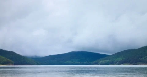 Time-lapse, beautiful clouds over the water Stock Footage 81893703