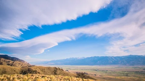 Time Lapse - Beautiful Clouds over Wilderness - 4K Stock Footage 91575019