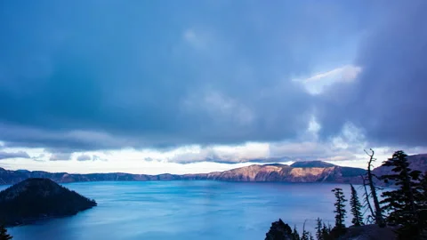 Time lapse - Beautiful Clouds over the mountain range in Crater Lake Stock Footage 165177419