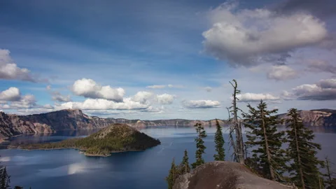 Time lapse - Beautiful Clouds over the mountain range in Crater Lake Stock Footage 166423812