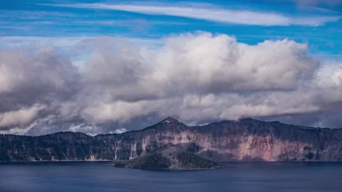 Time lapse - Beautiful Clouds over the mountain range in Crater Lake Stock Footage 166426830