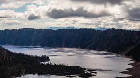 Time lapse - Beautiful Clouds over the mountain range in Crater Lake Stock Footage 166428637