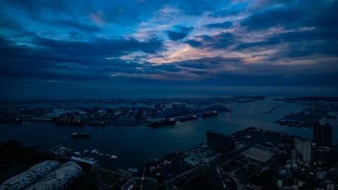 Time Lapse - Beautiful Cloudscape at Dawn in KaoHsiung Harbor Taiwan - 4K Stock Footage 101707645