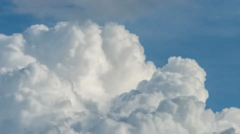 Time lapse - Beautiful cloudscape with large, storm clouds moving (4K)_01 Stock Footage 64725637