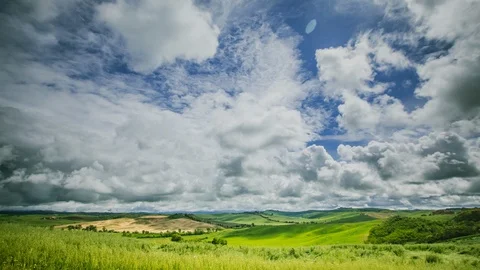 Time Lapse - Beautiful Cloudscape Over Tuscany Landscape  - 4K Stock Footage 112129637