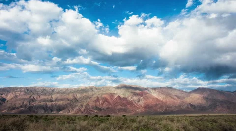 Time Lapse - Beautiful Moving Clouds Over Rocks and Mountains Stock Footage 49548093