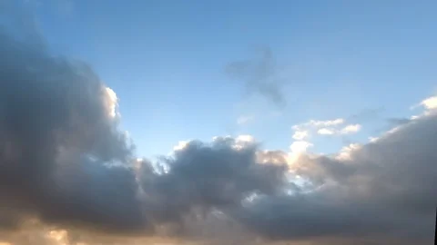 Time lapse: beautiful multicolored clouds are floating in the sky Video stock 129269990