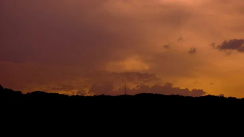Time lapse beautiful nature of sky at sunset with silhouettes of mountains. Stock Footage 190892183