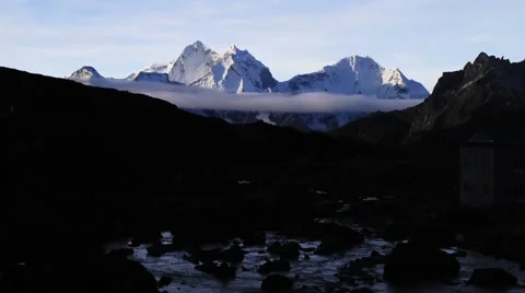 Time lapse of beautiful snowcapped mountain at dawn, Imja Glacier, Nepal Stock Footage 62388662