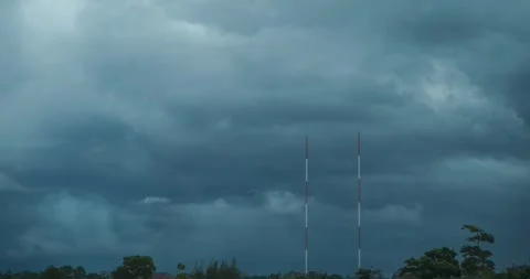 Time lapse of beautiful storm clouds moving in the sky over a residence. Stock Footage 254189020