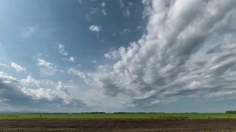 Time lapse of beautiful summer white and gray clouds  Stock Footage 132806946