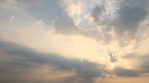 Time lapse of beautiful sun rising between clouds Stock Footage 162710231