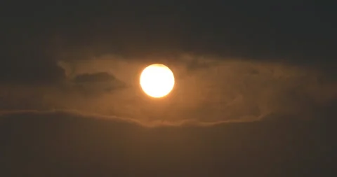 Time lapse of beautiful sun rising from behind mountains Stock Footage 162711015