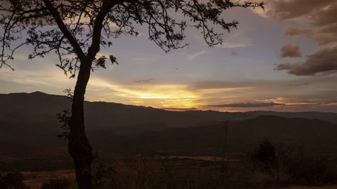 Time lapse of a beautiful sunset across a desert valley Stock Footage 92581811