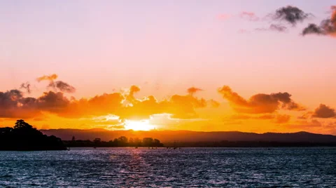 Time Lapse - Beautiful Sunset and Orange Clouds above the Sea Video stock 61182902