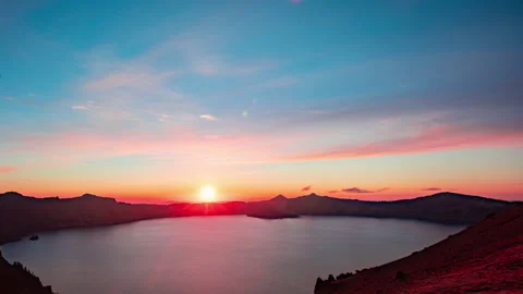 Time lapse - Beautiful sunset clouds over Crater Lake National Park in Oregon Stock Footage 164614251