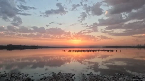 Time lapse of Beautiful Sunset with Clouds and Sea Water Stock Footage 247681621