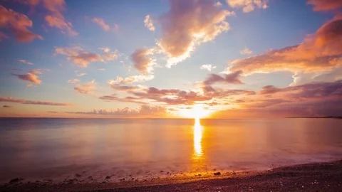 Time Lapse - Beautiful Sunset Cloudscape by the Ocean - 4K Stock Footage 84923554