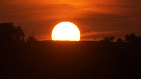 Time lapse of beautiful sunset with landscape silhouettes Stock-Footage 86856895
