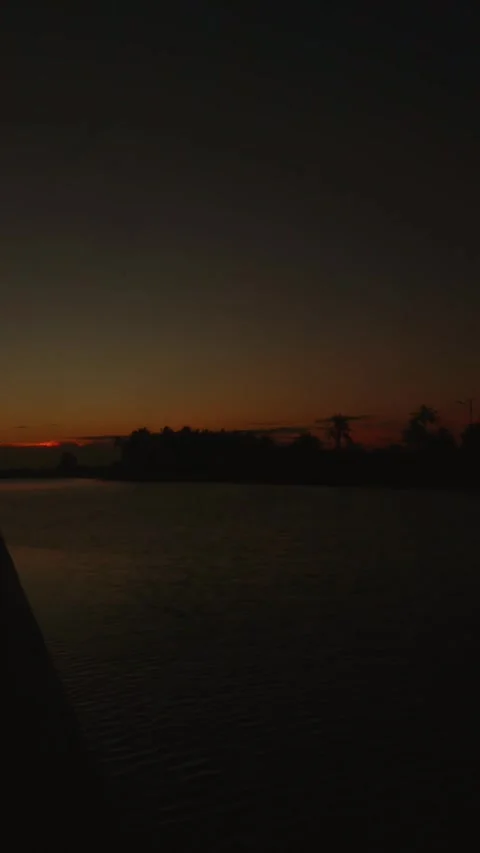 Time lapse of a beautiful sunset on the river. Summer landscape Stock Footage 297166331