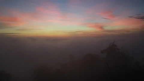 TIME LAPSE BEAUTIFUL SUNSRISE WITH DRAMATIC SKY AT HIGH PEAK Stock Footage 91893448