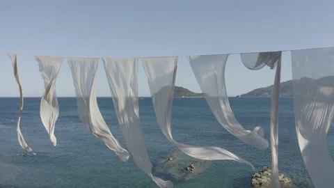 Time lapse of beautiful waving white lightweight fabric, sails in the ocean. Stock Footage 202080629