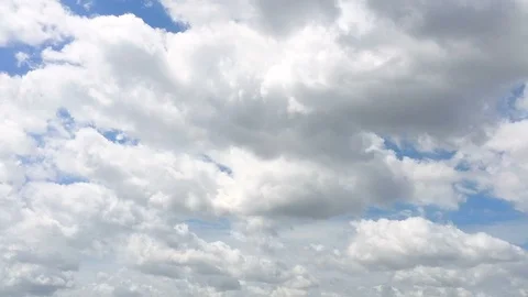 Time-lapse of the beautiful white cloud moving on the sunny day Stock Footage 90987537