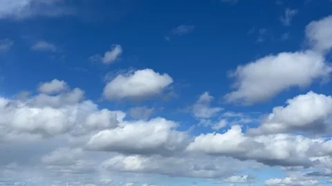 Time-lapse of beautiful white clouds moving and turning into rain clouds Stock Footage 270342345