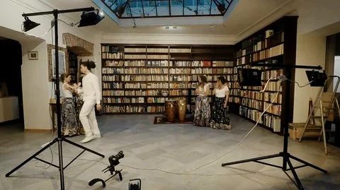 Time lapse of a beckstage of singers while the videomaker films on set Stock Footage 120030795