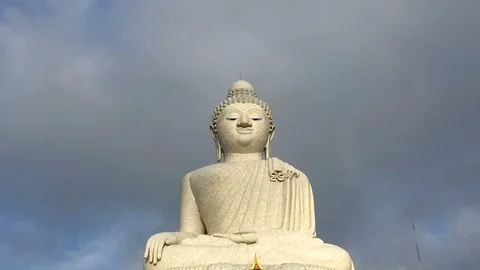 Time lapse of big buddha with clouds moving fast in the sky. Stock Footage 103928041