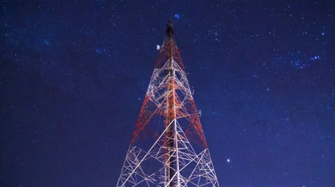 Time lapse big communication tower and starry movement in the night sky Video stock 33756675