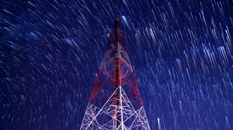 Time lapse big communication tower and startrail in the night sky Stock Footage 33784580