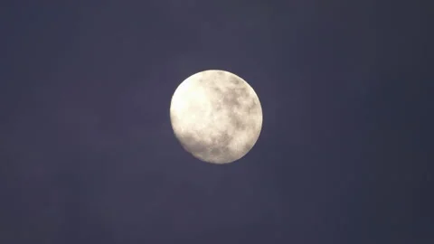 Time lapse of Big full moon behind moving clouds in 4K Stock Footage 124060086